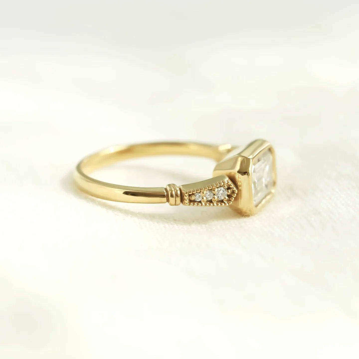 HORIZONTAL EMERALD CUT SOLITAIRE RING - Mim Diamond